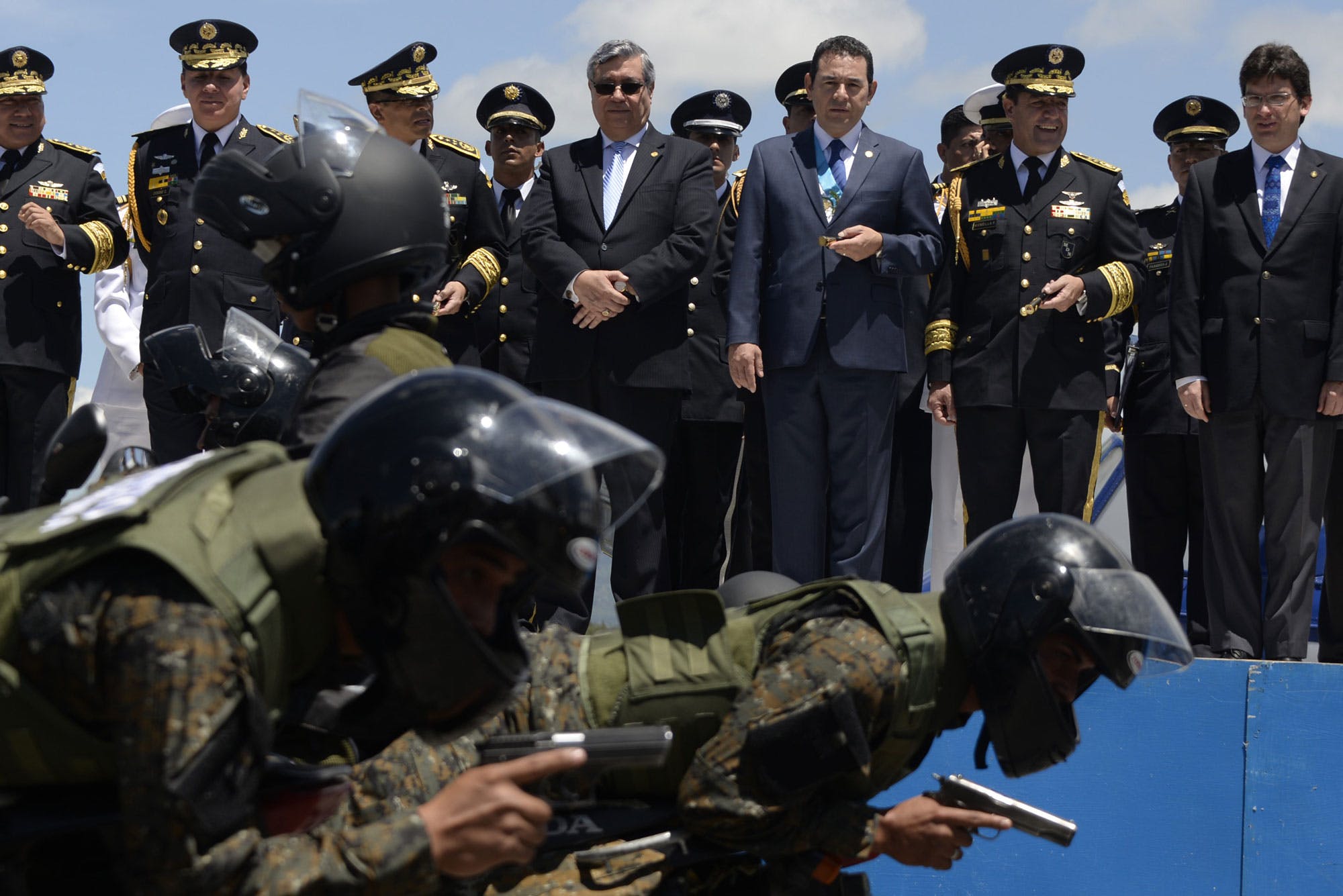 Guatemalan President Jimmy Morales (3-R) attends a military parade during the celebration of the Army Day in Guatemala City, on July 3, 2016. / AFP / JOHAN ORDONEZ        (Photo credit should read JOHAN ORDONEZ/AFP/Getty Images)