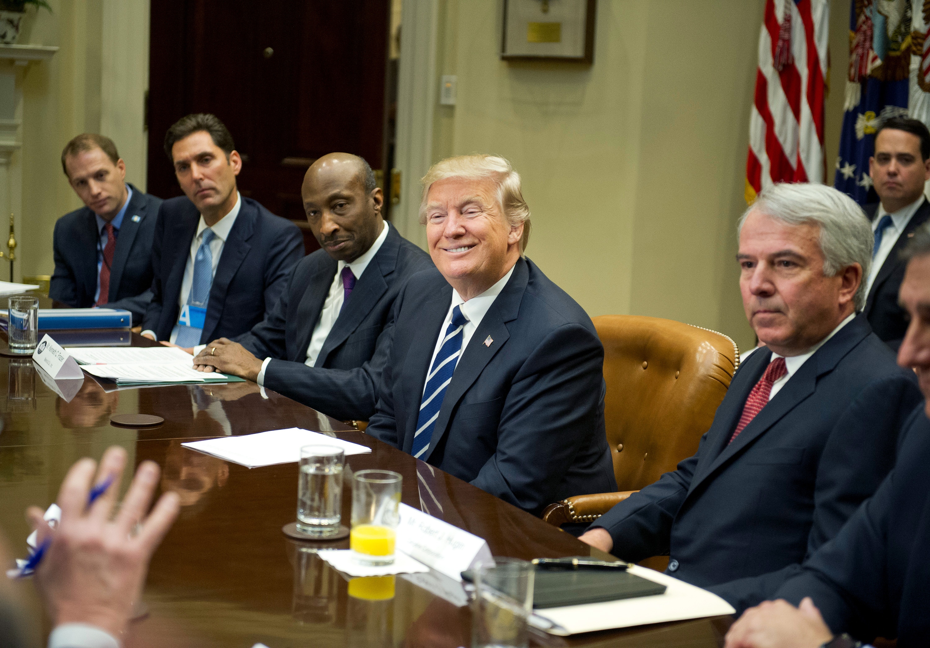 WASHINGTON, DC - JANUARY 31: (AFP OUT) U.S. President Donald Trump meets with representatives from PhRMA, the Pharmaceutical Research and Manufacturers of America, in the Roosevelt Room of the White House on January 31, 2017 in Washington, DC.  According to its website PhRMA "represents the countrys leading biopharmaceutical researchers and biotechnology companies."   From left to right: Josh Pitcock, Chief of Staff to the Vice President; Stephen Ubl, President and CEO, PhARMA; Kenneth C. Frazier, Chairman and CEO of Merck & Co; the President; and Robert J. Hugin, Executive Chairman, Celgene Corporation. (Photo by Ron Sachs - Pool/Getty Images)