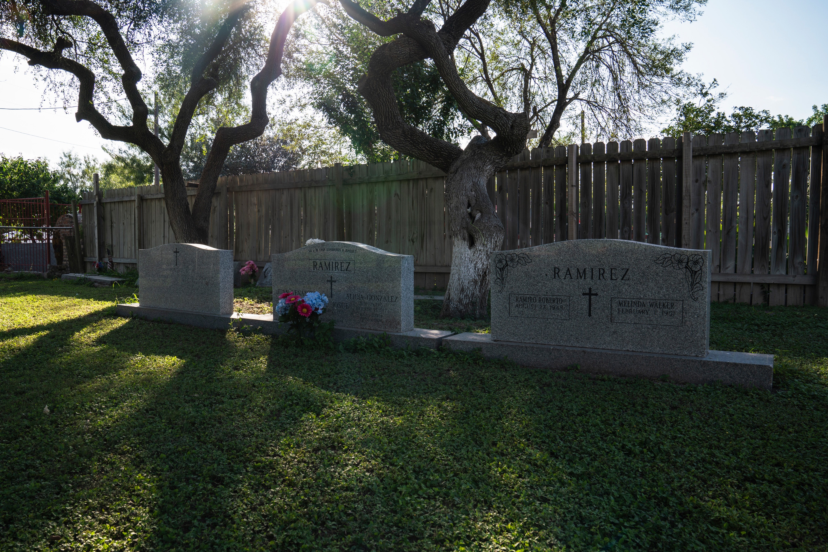 Ramiro Roberto Ramírez’s parent’s graves at the Martin Jackson Church and Cemetery in San Juan, Tex. on Nov. 6, 2018. Ramírez, his wife and sister will be buried there where their headstones are already engraved with their names. The new proposed wall would leave this property on the south side of it.Photo: Verónica G. Cárdenas for The Intercept
