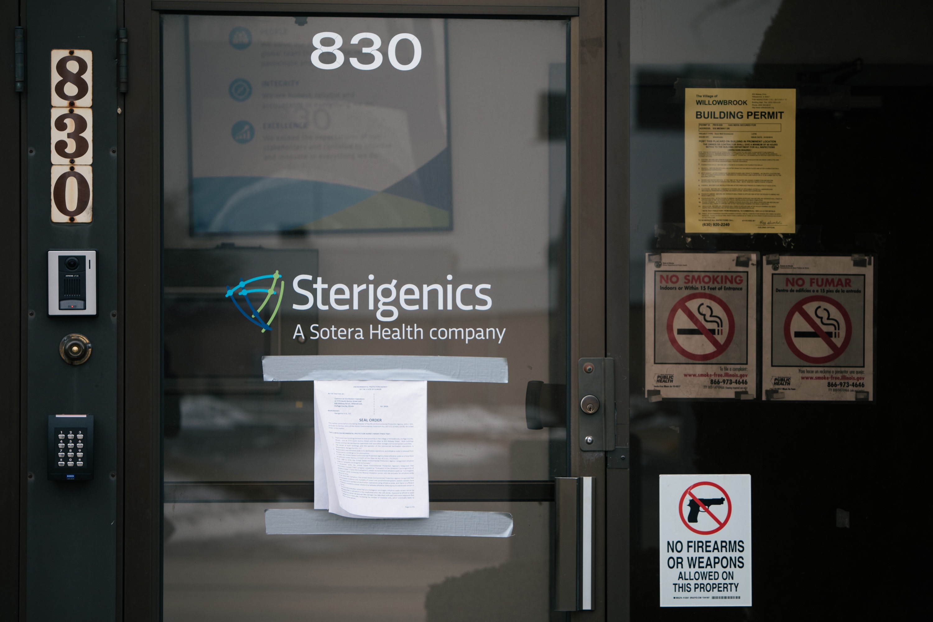 Willowbrook, Illinois -- Thursday, February 22, 2019. A seal order from the Environmental Protection Agency of the state of Illinois is duct taped to every outside door at the Sterigenics plant, which has been emitting a carcinogenic chemical called ethylene oxide. One of the buildings is about 0.2-miles away from homes in Willowbrook. CREDIT: Alyssa Schukar for The Intercept