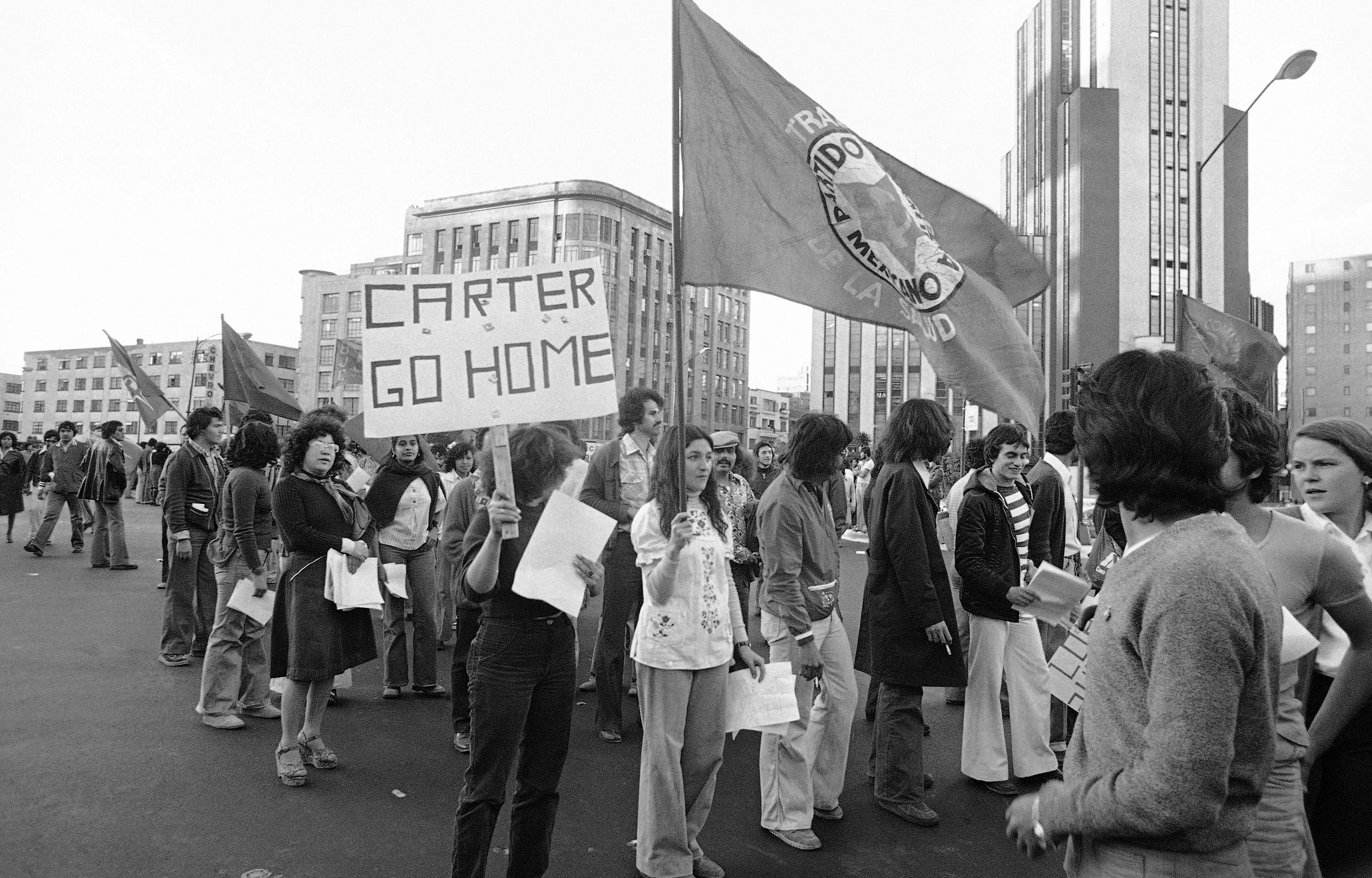 Members of Mexico?s Socialist Workers Party carry placard with anti-Carter slogan in Mexico City, Feb. 7, 1979. March was called by telephone workers protesting for higher wages, but they were joined by 15 to 20 other organizations which focused on Carter?s upcoming visit to Mexico Feb. 14 to 16. Police estimated 5,000 persons took part in the demonstration. (AP Photo/Valente Cotera)