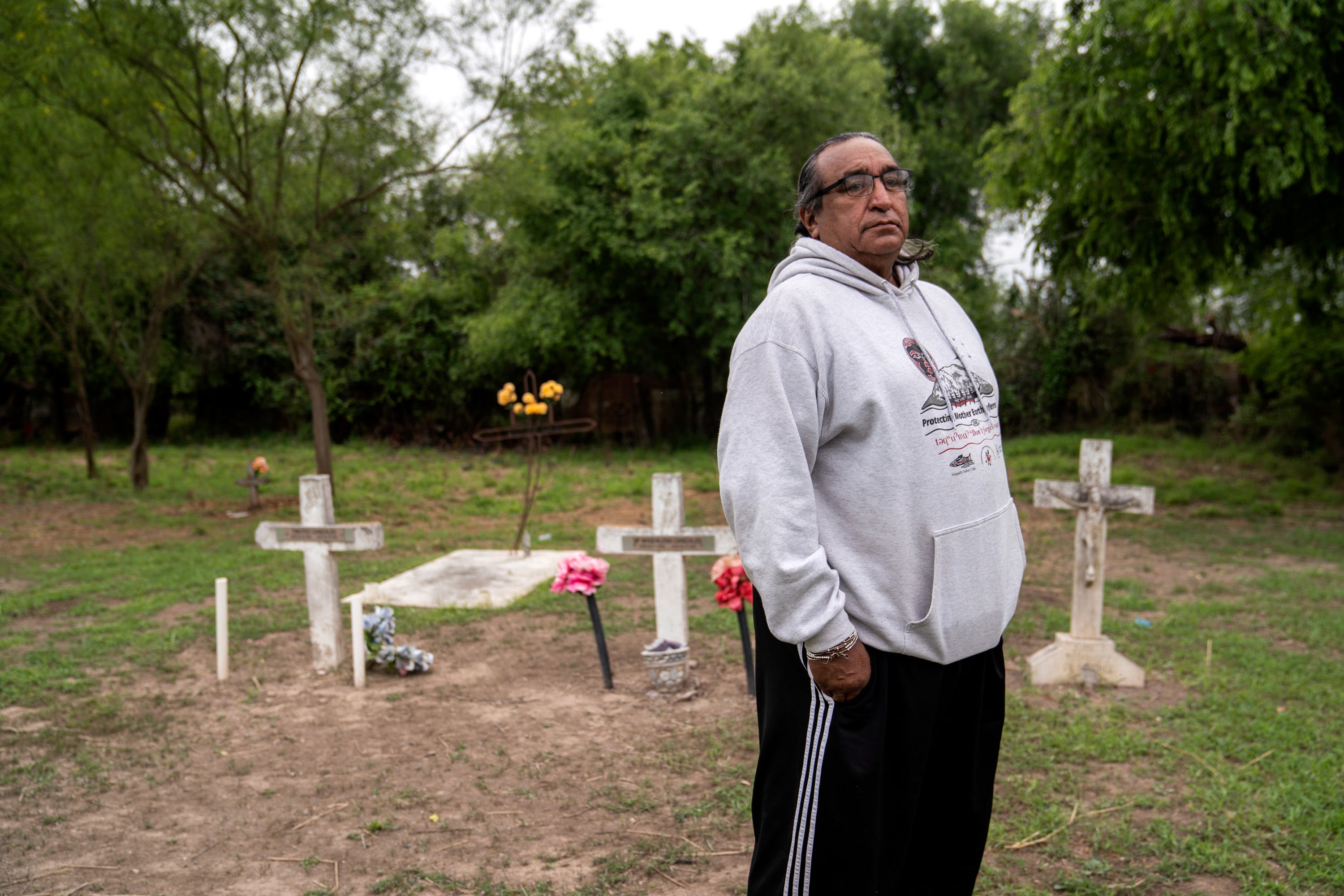Juan B. Mancias poses for a photo at the Eli Jackson Cemetery in Hidalgo County, Texas on March 17, 2019. Photo: Verónica G. Cárdenas for The Intercept