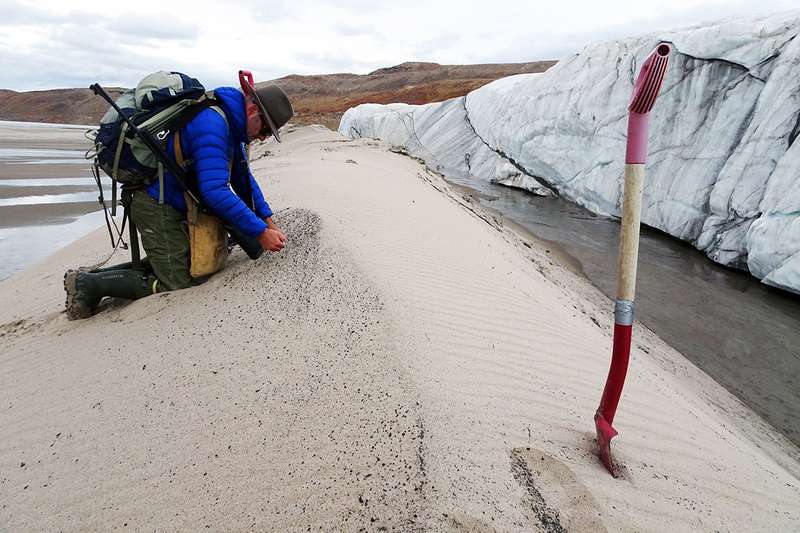 sampling sand in Greenland
